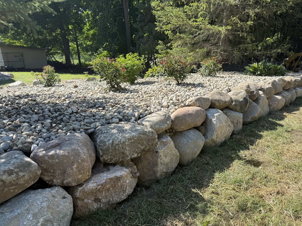 Boulder retaining wall